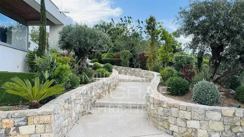 Contemporary Villa Heated infinity pool spa, jacuzzi, sauna, pizza oven and barbecue, 5 bedrooms in Mougins search rental For Super Rich