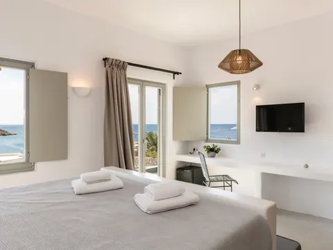 Luxury Villa Sea View, jacuzzi, swimming pool, and a beautifully landscaped garden, 7 bedrooms in Mykonos buy for sale For Super Rich