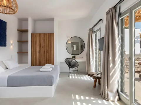 Luxury Villa Sea View, jacuzzi, swimming pool, and a beautifully landscaped garden, 7 bedrooms in Mykonos price for sale For Super Rich