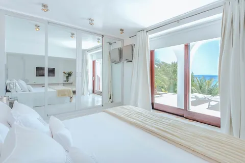 Modern Minimalist Villa Sea View most exclusive Bay on the island, 5 bedrooms in San José - Ibiza property for sale For Super Rich