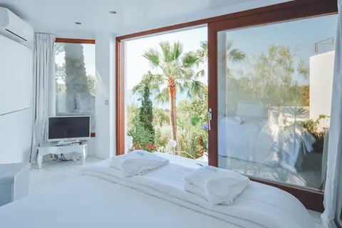 Modern Minimalist Villa Sea View most exclusive Bay on the island, 5 bedrooms in San José - Ibiza best for sale For Super Rich
