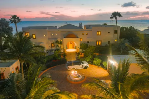 Moroccan Style House Beach Front Tropical landscaping, 7 bedrooms in Sapodilla Bay ads for sale For Super Rich