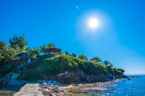 Elegant Villa Beach Front 10 meters from your doorstep, 5 bedrooms in Halkidiki available for sale For Super Rich