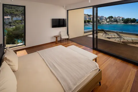 Modern Villa Beach Front direct access to the natural rocky beach, 4 bedrooms in Primosten price for sale For Super Rich