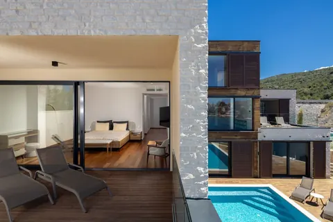 Modern Villa Beach Front direct access to the natural rocky beach, 4 bedrooms in Primosten value for sale For Super Rich