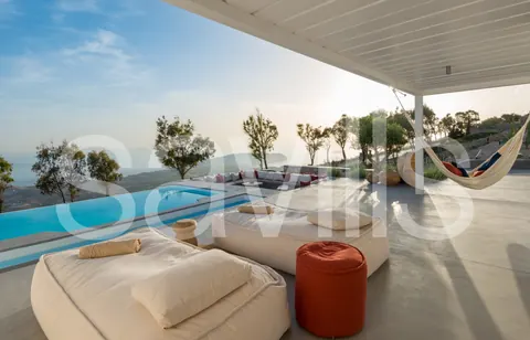 Architectural Villa Panoramic romantic setting Pool facing Greek beaches, 8 bedrooms in Santorini buy for sale For Super Rich