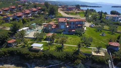 Elegant Villa Beach Front 10 meters from your doorstep, 5 bedrooms in Halkidiki Used for sale For Super Rich
