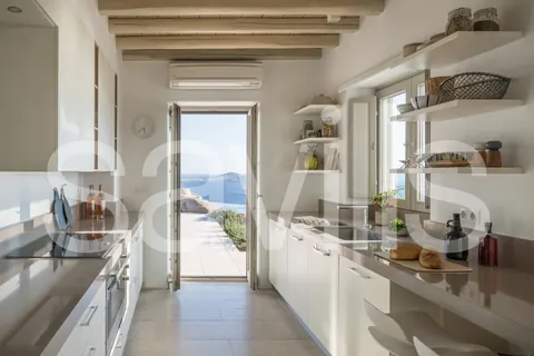 Architectural Villa Breathtaking 180-degrees views Rock Swimming pool, 10 bedrooms in Mykonos deal for sale For Super Rich