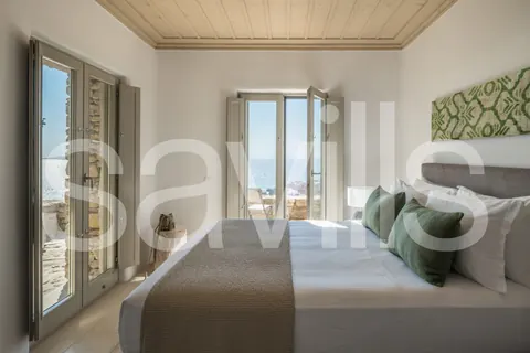 Architectural Villa Breathtaking 180-degrees views Rock Swimming pool, 10 bedrooms in Mykonos luxury for sale For Super Rich