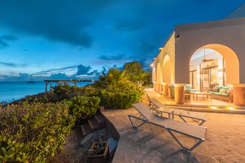 Moroccan Style House Beach Front Tropical landscaping, 7 bedrooms in Sapodilla Bay buy for sale For Super Rich