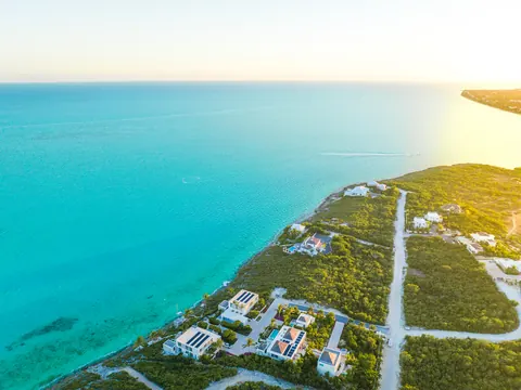 Luxury House Beach Front pickleball court, outdoor cinema, 14 bedrooms in Providenciales MLS 2300009 for sale For Super Rich