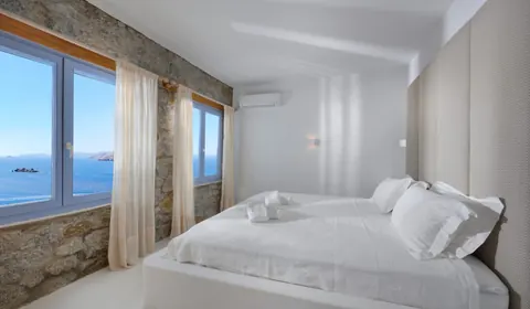 Architectural Villa one-of-a-kind location access sea, stunning panoramic view from Pinnacle Estate, 14 bedrooms in Mykonos expensive for sale For Super Rich