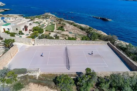 Luxury Villa Panoramic views of the sea, Comino and Cirkewwa Private beach access, Tennis court, 5 bedrooms in Gozo value for sale For Super Rich