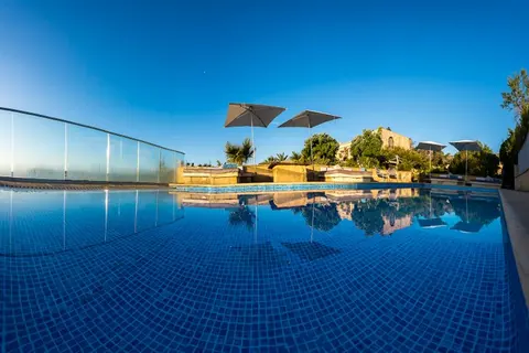 Luxury Villa Panoramic views of the sea, Comino and Cirkewwa Private beach access, Tennis court, 5 bedrooms in Gozo search for sale For Super Rich