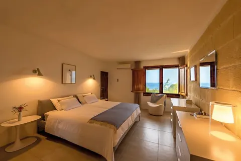 Luxury Villa Panoramic views of the sea, Comino and Cirkewwa Private beach access, Tennis court, 5 bedrooms in Gozo real estate for sale For Super Rich