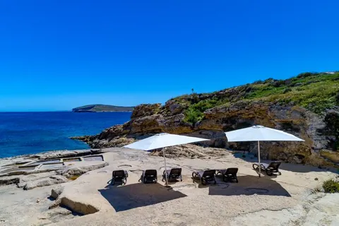 Luxury Villa Panoramic views of the sea, Comino and Cirkewwa Private beach access, Tennis court, 5 bedrooms in Gozo price for sale For Super Rich
