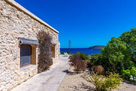 Luxury Villa Panoramic views of the sea, Comino and Cirkewwa Private beach access, Tennis court, 5 bedrooms in Gozo property for sale For Super Rich