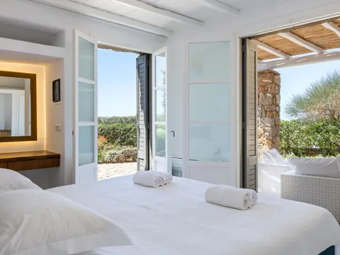 Modern Villa Beach Front panoramic Aegean Sea views, 6 bedrooms in Mykonos real estate for sale For Super Rich