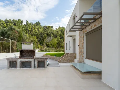 Modern Villa Beach Front 10 meters from the crystal-clear waters of the Aegean Sea, 5 bedrooms in Halkidiki photos for sale For Super Rich