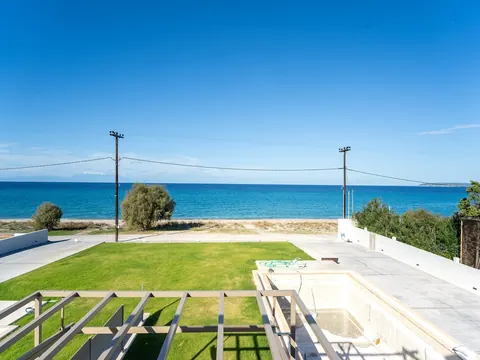 Modern Villa Beach Front 10 meters from the crystal-clear waters of the Aegean Sea, 5 bedrooms in Halkidiki buy for sale For Super Rich