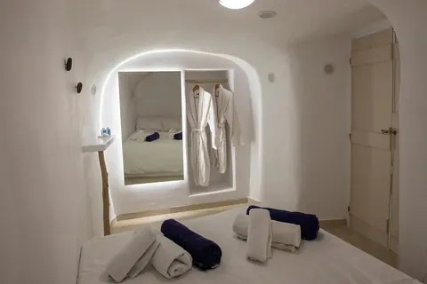 Luxury Villa Panoramic view of Caldera and the Aegean Sea 70m2 terrace with Jacuzzi, 3 bedrooms in Santorini value for sale For Super Rich