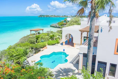 Moroccan Style House Beach Front Tropical landscaping, 7 bedrooms in Sapodilla Bay price for sale For Super Rich