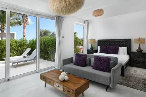 Luxury House Beach Front pickleball court, outdoor cinema, 14 bedrooms in Providenciales buy for sale For Super Rich