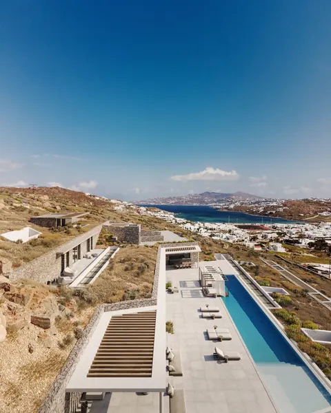 Luxury Villa Geometric shapes Substantial infinity pool and spa over the bay, 6 bedrooms in Mykonos buy for sale For Super Rich