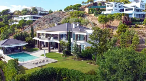 Architectural Villa 72 sqm infinity pool gated community of "La Reserva del Alcuzcuz", 9 bedrooms in Los Arqueros - Benahavis - Marbella property for sale For Super Rich