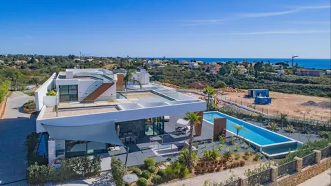 Architectural Villa Fantastic views facing the sea, 4 bedrooms in Faro - Lagoa - Algarve price for sale For Super Rich
