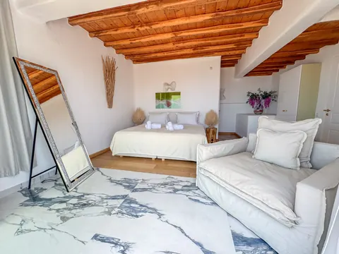 Premium Hotel Panoramic sea view overlooking the Aegean, Tennis court, 29 bedrooms in Mykonos best for sale For Super Rich