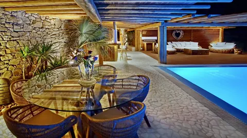 Premium Hotel Panoramic sea view overlooking the Aegean, Tennis court, 29 bedrooms in Mykonos unique for sale For Super Rich
