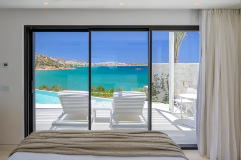 Premium Hotel Beach Front seaside, heated swimming pool with bar, 15 bedrooms in Nikolaos - Crete value for sale For Super Rich