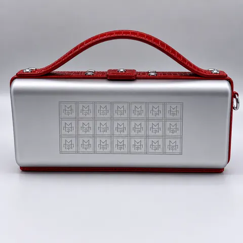 La Pochette. Crocodile leather and aluminium by Maison Philippe Montagne