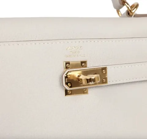 Hermès Kelly 25 Gris Pale Togo with Gold Hardware price country for sale For Super Rich Hermès Kelly 25 Gris Pale Togo with Gold Hardware price country for sale For Super Rich