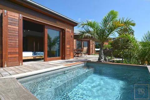 Luxury Villa Danse du Soleil tropical gardens with sea view, heated pool, 5 bedrooms in St Barth real estate rental For Super Rich